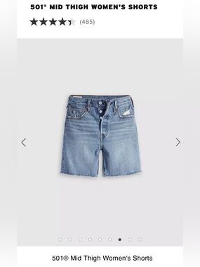 Levi's Mid-Thigh Medium Wash Frayed Hem Denim Shorts